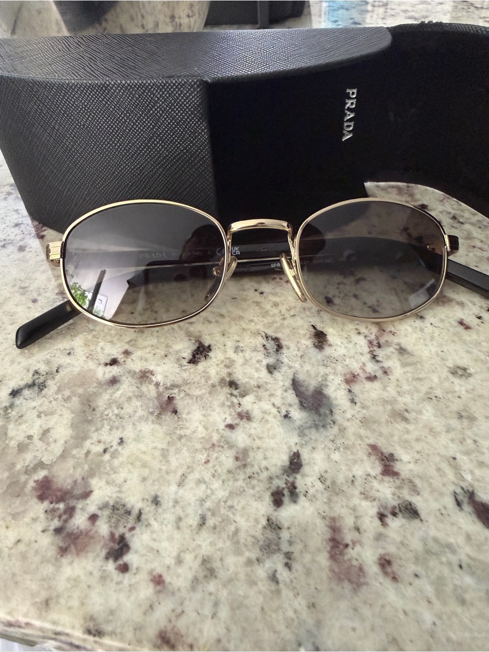 Prada Gold Frame Sunglasses with Gray Lenses
